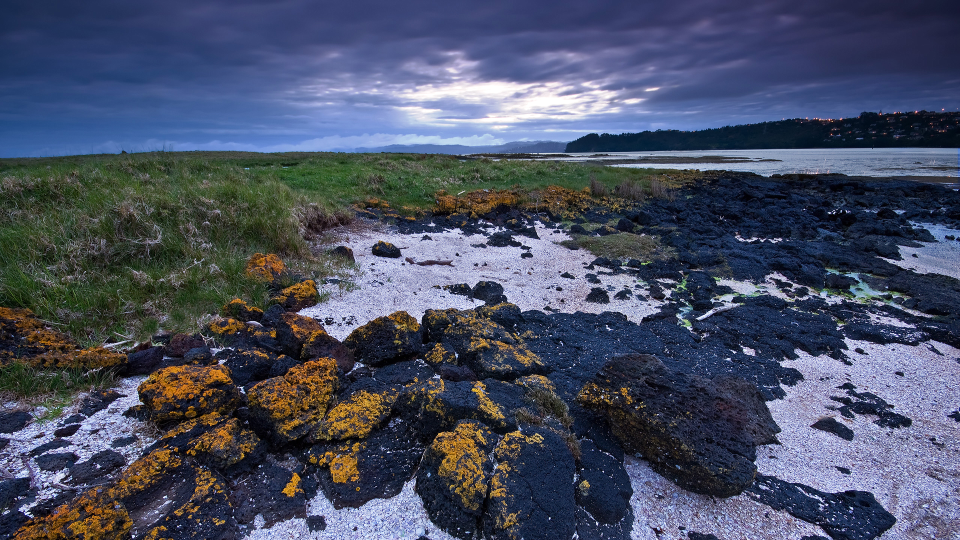 Coastal Landscape with Rocky Shoreline and Dramatic Sky