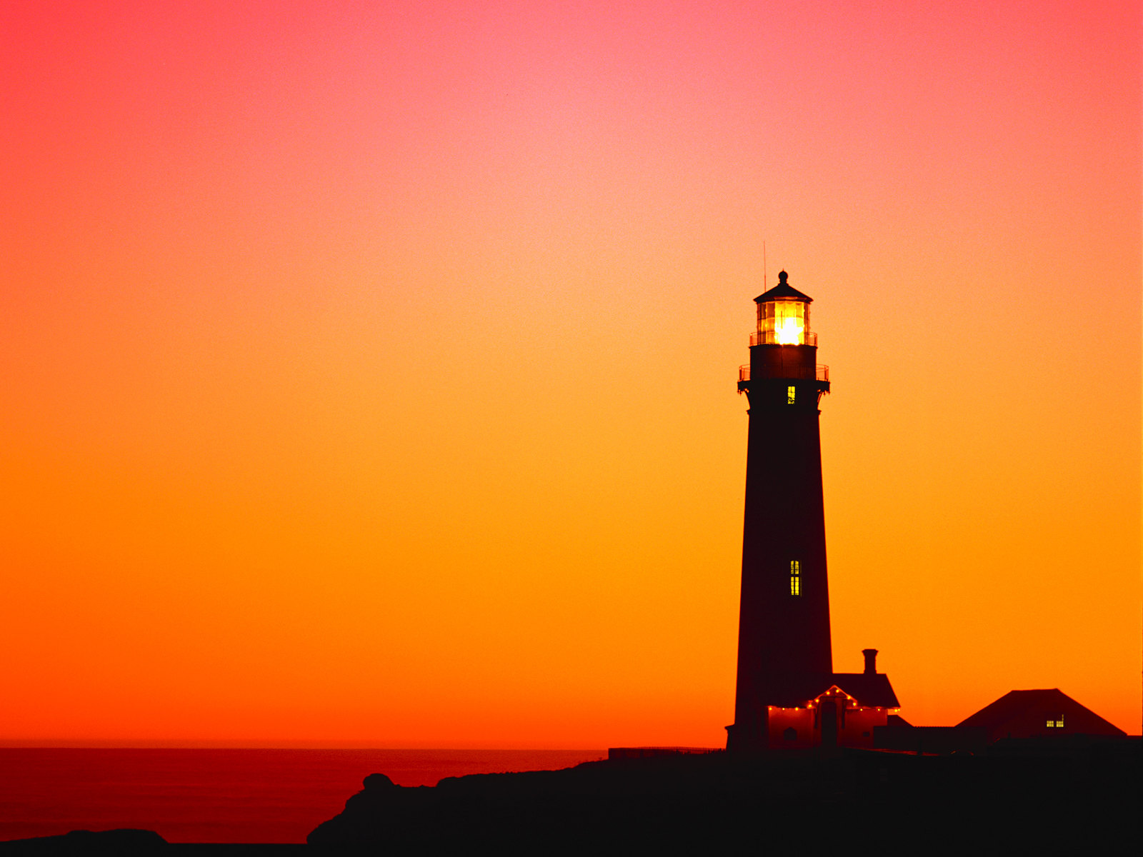 Twilight Guardian: A Lighthouse at Sunset